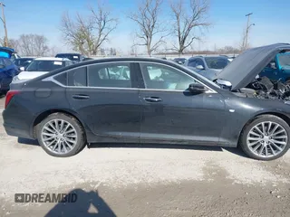 2024 Cadillac CT5 Premium Luxury z VIN 1G6DT5RW6R0108393, wystawiony jako IAAI lot #41404644 z przebiegiem 10 370 mil mil oraz . Historia ofert i sprzedaży dostępna na DreamBid. Obrazek 13.