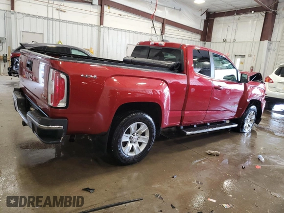 2015 GMC Canyon 4WD SLE with VIN 1GTH6BE38F1243073, listed as a Copart auction lot 53676815 with 142,938 mi miles and Non repairable. Bid and sale history available at DreamBid. Image 3.