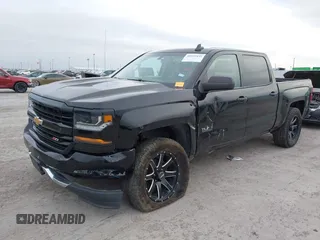 2017 Chevrolet Silverado 1500 LT with VIN 1GCUKREC2HF208232, listed as a IAAI auction lot 40933445 with 105,928 mi miles and . Bid and sale history available at DreamBid. Image 6.