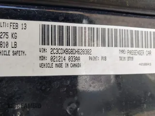 2013 Dodge Charger SE with VIN 2C3CDXBG8DH628382, listed as a IAAI auction lot 41850950 with 252,392 mi miles and . Bid and sale history available at DreamBid. Image 9.
