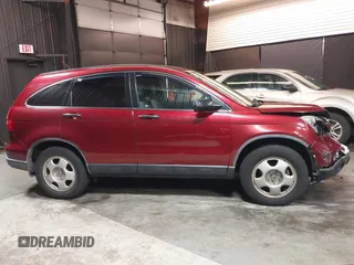 2009 Honda CR-V LX with VIN JHLRE48339C018957, listed as a IAAI auction lot 41952951 with 76,502 mi miles. Bid and sale history available at carsss.com. Image 13.