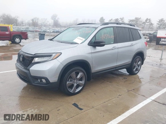 2021 Honda Passport Touring z VIN 5FNYF8H9XMB019732, wystawiony jako IAAI lot #41459208 z przebiegiem 41 745 mil mil oraz . Historia ofert i sprzedaży dostępna na DreamBid. Obrazek 17.