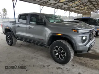 2024 GMC Canyon 4WD AT4X with VIN 1GTP6EEK1R1158021, listed as a Copart auction lot 43359665 with 14,120 mi miles and Salvage Title. Bid and sale history available at carsss.com. Image 4.