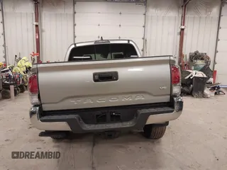 2023 Toyota Tacoma SR z VIN 3TMCZ5AN4PM597509, wystawiony jako IAAI lot #42020023 z przebiegiem 36 941 mil mil oraz . Historia ofert i sprzedaży dostępna na DreamBid. Obrazek 16.