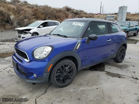 2014 MINI Cooper Paceman S with VIN WMWSS7C50EWN52263, listed as a Copart auction lot 86142774 with 83270 miles and Salvage Title. Bid and sale history available at carsss.com. Image 1.