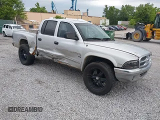 2001 Dodge Dakota Sport with VIN 1B7HG2AN91S225379, listed as a IAAI auction lot 42443304 with 209,957 mi miles and . Bid and sale history available at DreamBid. Image 1.