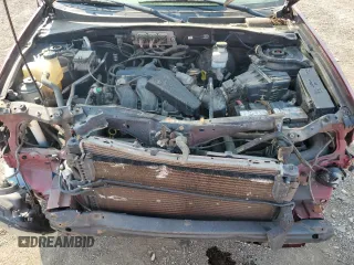 2006 Mercury Mariner Luxury with VIN 4M2YU57146KJ07465, listed as a Copart auction lot 62532264 with 126,009 mi miles and Salvage title. Bid and sale history available at DreamBid. Image 14.