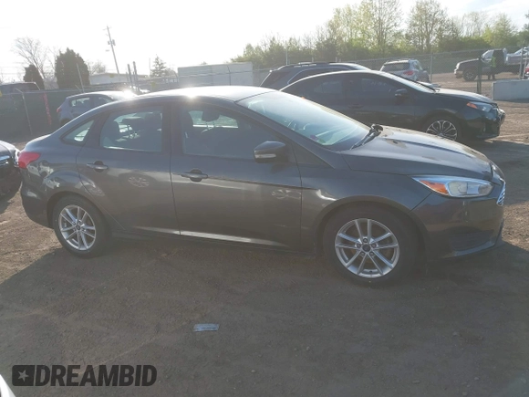 2016 Ford Focus SE with VIN 1FADP3F2XGL207906, listed as a IAAI auction lot 42099203 with 95,527 mi miles. Bid and sale history available at carsss.com. Image 13.