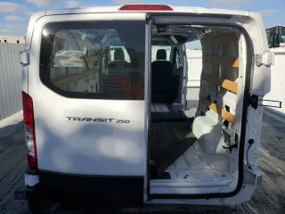 2023 Ford Transit Cargo with VIN 1FTBR1Y8XPKB11653, listed as a Copart auction lot 84255434 with Not Provided miles and Clean Title. Bid and sale history available at DreamBid. Image 6.