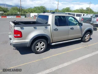 2007 Ford Explorer Sport Trac XLT with VIN 1FMEU31K17UA00941, listed as a IAAI auction lot 41916768 with 134,802 mi miles. Bid and sale history available at carsss.com. Image 4.