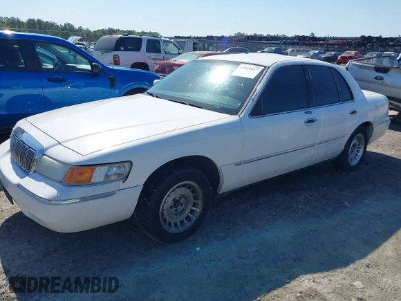 2000 Mercury Grand Marquis LS z VIN 2MEFM75W3YX689323, wystawiony jako IAAI lot #42019687 z przebiegiem 241 045 mil mil oraz . Historia ofert i sprzedaży dostępna na DreamBid. Obrazek 17.