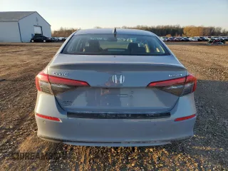 2022 Honda Civic Touring z VIN 2HGFE1F90NH324934, wystawiony jako Copart lot #48501555 z przebiegiem 99 825 mil mil oraz Szkoda całkowita • Salvage title. Historia ofert i sprzedaży dostępna na DreamBid. Obrazek 6.