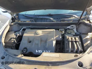 2011 Cadillac SRX z VIN 3GYFNGEY4BS544204, wystawiony jako Copart lot #52277474 z przebiegiem 92 305 mil mil oraz Szkoda całkowita • Salvage title. Historia ofert i sprzedaży dostępna na DreamBid. Obrazek 11.