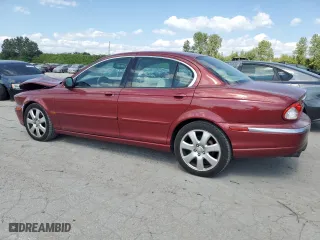 2004 Jaguar X-Type with VIN SAJEA51CX4WD60022, listed as a Copart auction lot 70491824 with 121,443 mi miles and Salvage Title. Bid and sale history available at carsss.com. Image 2.