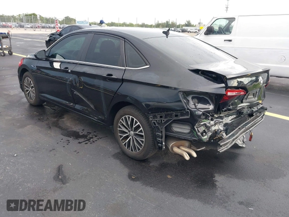 2019 Volkswagen Jetta SEL z VIN 3VWEB7BU2KM273950, wystawiony jako IAAI lot #42414034 z przebiegiem 84 100 mil mil oraz . Historia ofert i sprzedaży dostępna na DreamBid. Obrazek 3.