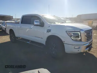 2021 Nissan Titan XD SV with VIN 1N6AA1FB0MN517885, listed as a Copart auction lot 77046004 with 52,284 mi miles and Salvage Title. Bid and sale history available at carsss.com. Image 4.
