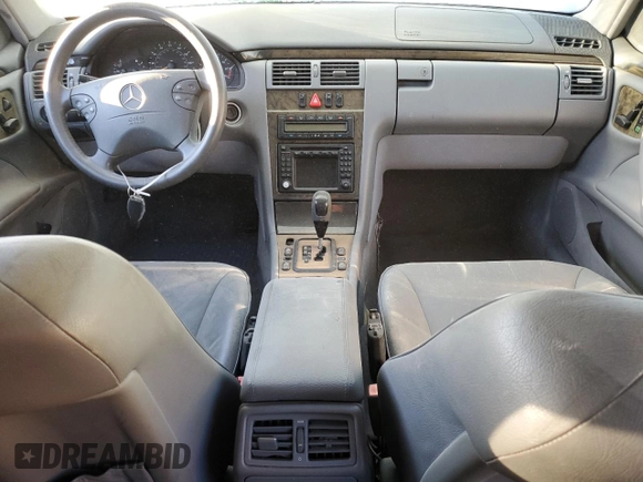 2002 Mercedes-Benz E-Class with VIN WDBJF65J32B496411, listed as a Copart auction lot 75690884 with 128,855 mi miles and Salvage Title. Bid and sale history available at carsss.com. Image 8.