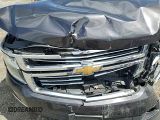2015 Chevrolet Tahoe LTZ with VIN 1GNSKCKC9FR698924, listed as a Copart auction lot 56196895 with 184,740 mi miles and Salvage title. Bid and sale history available at DreamBid. Image 12.
