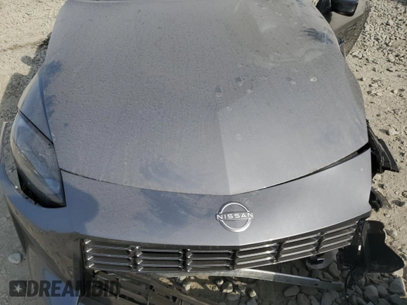 2024 Nissan Z Sport z VIN JN1BZ4AH7RM362538, wystawiony jako Copart lot #71589374 z przebiegiem Nie podano mil oraz Szkoda całkowita • Salvage title. Historia ofert i sprzedaży dostępna na DreamBid. Obrazek 12.