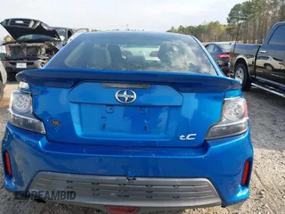 2014 Scion tC with VIN JTKJF5C72E3086001, listed as a IAAI auction lot 41721986 with 207,239 mi miles. Bid and sale history available at carsss.com. Image 16.