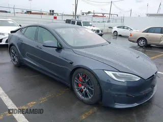 2022 Tesla Model S with VIN 5YJSA1E52NF459460, listed as a IAAI auction lot 41736236 with Not Provided miles and . Bid and sale history available at DreamBid. Image 1.