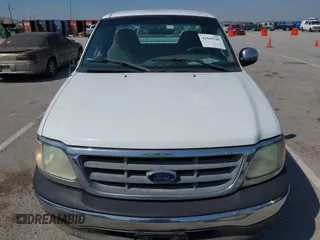 2002 Ford F-150 XL with VIN 1FTRF17W72NA67786, listed as a IAAI auction lot 41869585 with 180,262 mi miles. Bid and sale history available at carsss.com. Image 6.