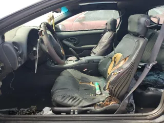 2000 Pontiac Firebird Formula z VIN 2G2FV22G9Y2140113, wystawiony jako Copart lot #76135324 z przebiegiem Nie podano mil oraz Szkody całkowita. Historia ofert i sprzedaży dostępna na DreamBid. Obrazek 7.