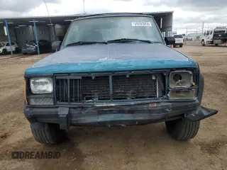 1996 Jeep Cherokee Sport with VIN 1J4FJ68S3TL251074, listed as a Copart auction lot 59593955 with 181,482 mi miles and Salvage title. Bid and sale history available at DreamBid. Image 5.