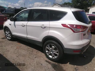 2013 Ford Escape SEL with VIN 1FMCU0HX1DUB63673, listed as a IAAI auction lot 42232003 with 116,230 mi miles and . Bid and sale history available at DreamBid. Image 3.