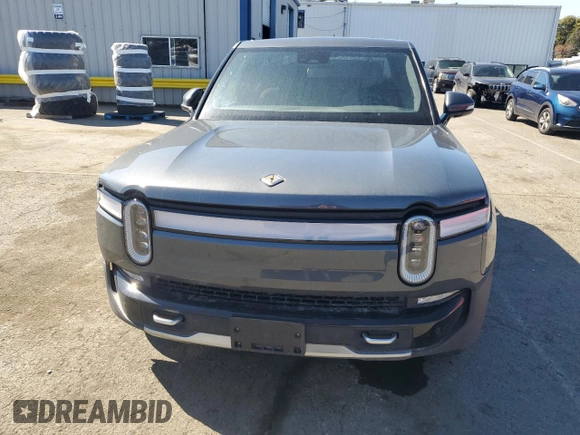 2022 Rivian R1T Adventure z VIN 7FCTGAAA5NN014843, wystawiony jako Copart lot #47668545 z przebiegiem 42 640 mil mil oraz Szkody całkowita. Historia ofert i sprzedaży dostępna na DreamBid. Obrazek 5.