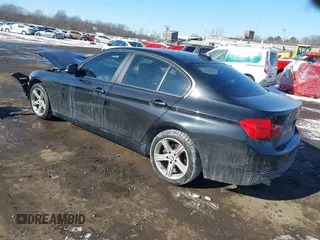 2014 BMW 3 Series 328d xDrive with VIN WBA3D5C57EKX98964, listed as a IAAI auction lot 41395268 with 135,272 mi miles. Bid and sale history available at carsss.com. Image 3.