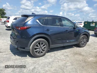 2018 Mazda CX-5 Grand Touring with VIN JM3KFADM1J1387297, listed as a Copart auction lot 60589625 with 92,283 mi miles and Non repairable. Bid and sale history available at DreamBid. Image 3.