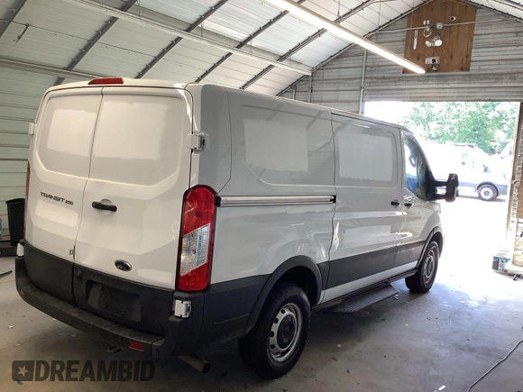 2020 Ford Transit Cargo with VIN 1FTBR1Y85LKB76565, listed as a IAAI auction lot 42294606 with 141,999 mi miles and . Bid and sale history available at DreamBid. Image 20.