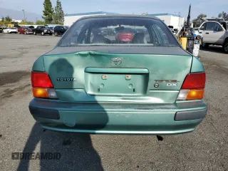 1995 Toyota Tercel DX z VIN JT2EL56E2S7019018, wystawiony jako Copart lot #84929224 z przebiegiem 241 078 mil mil oraz Szkoda całkowita • Salvage title. Historia ofert i sprzedaży dostępna na DreamBid. Obrazek 6.