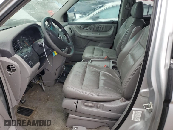 2004 Honda Odyssey EX-L with VIN 5FNRL18984B025100, listed as a Copart auction lot 53227364 with 331,293 mi miles and Salvage Title. Bid and sale history available at DreamBid. Image 7.