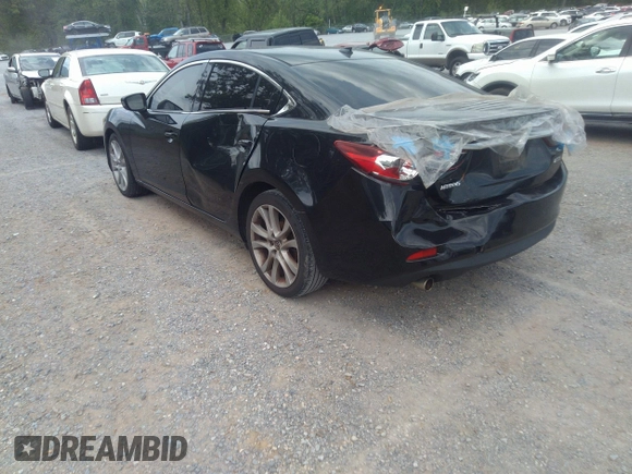2015 Mazda 6 i Grand Touring with VIN JM1GJ1W68F1168078, listed as a IAAI auction lot 42149519 with 127,641 mi miles and . Bid and sale history available at DreamBid. Image 3.