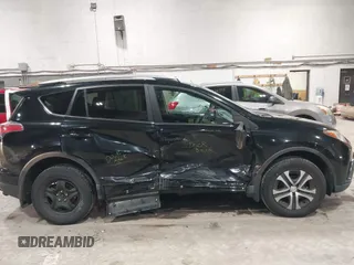 2017 Toyota RAV4 LE with VIN 2T3BFREV8HW571887, listed as a IAAI auction lot 41612815 with 100,742 mi miles and . Bid and sale history available at DreamBid. Image 14.