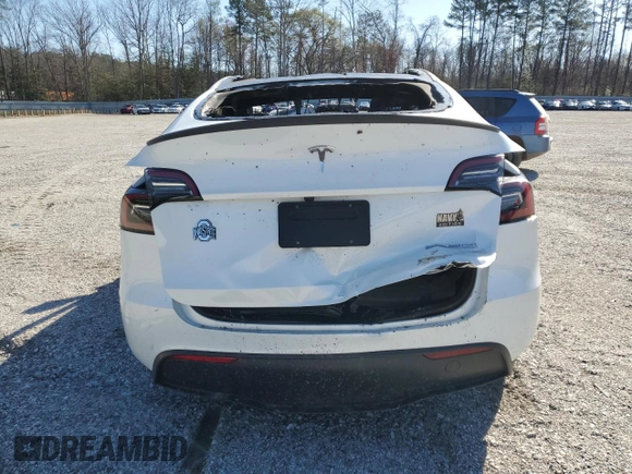 2024 Tesla Model Y Performance z VIN 7SAYGDEF5RF183755, wystawiony jako Copart lot #47230175 z przebiegiem Nie podano mil oraz Szkoda całkowita • Salvage title. Historia ofert i sprzedaży dostępna na DreamBid. Obrazek 6.