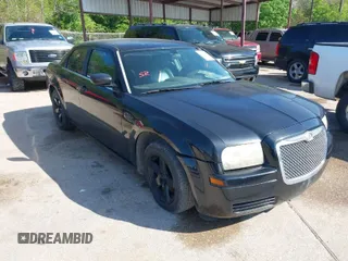 2005 Chrysler 300 with VIN 2C3JA43R65H668010, listed as a IAAI auction lot 41976405 with 216,099 mi miles. Bid and sale history available at carsss.com. Image 1.