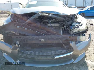 2015 Infiniti Q50 Premium with VIN JN1BV7AR2FM392399, listed as a IAAI auction lot 41978343 with 108,679 mi miles and . Bid and sale history available at DreamBid. Image 6.
