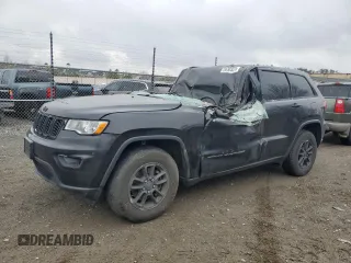 2018 Jeep Grand Cherokee Laredo E with VIN 1C4RJFAG8JC457884, listed as a Copart auction lot 50303215 with Not Provided miles and Salvage Title. Bid and sale history available at DreamBid. Image 1.