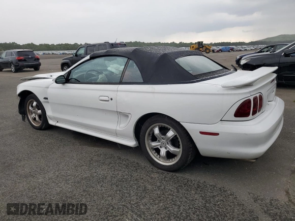 1996 Ford Mustang GT with VIN 1FALP45X9TF225224, listed as a Copart auction lot 66895564 with 113,282 mi miles and Salvage Title. Bid and sale history available at carsss.com. Image 2.