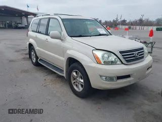 2003 Lexus GX 470 with VIN JTJBT20X630011479, listed as a IAAI auction lot 41556491 with 310,198 mi miles. Bid and sale history available at carsss.com. Image 1.
