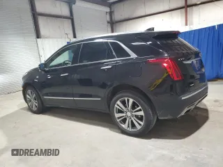 2025 Cadillac XT5 AWD Premium Luxury z VIN 1GYKNDRS0SZ119763, wystawiony jako Copart lot #57577715 z przebiegiem 10 682 mil mil oraz Tytuł czysty. Historia ofert i sprzedaży dostępna na DreamBid. Obrazek 2.