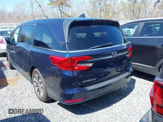 2022 Honda Odyssey EX-L with VIN 5FNRL6H7XNB061061, listed as a IAAI auction lot 41257019 with 52,194 mi miles and . Bid and sale history available at DreamBid. Image 3.