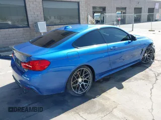 2015 BMW 4 Series 435i with VIN WBA3R1C50FF774588, listed as a IAAI auction lot 42001394 with 96,400 mi miles and . Bid and sale history available at carsss.com. Image 4.