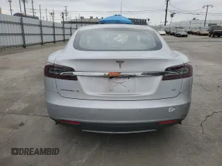 2014 Tesla Model S 60 with VIN 5YJSA1H14EFP34335, listed as a Copart auction lot 65504325 with Not provided miles and Clean title. Bid and sale history available at DreamBid. Image 6.