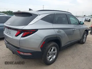 2024 Hyundai Tucson SEL with VIN 5NMJBCDE8RH305362, listed as a IAAI auction lot 42123366 with 48,431 mi miles. Bid and sale history available at carsss.com. Image 4.