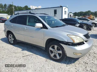 2006 Lexus RX 330 with VIN 2T2GA31U46C045659, listed as a Copart auction lot 60987985 with 122,714 mi miles and Salvage title. Bid and sale history available at DreamBid. Image 4.