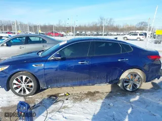 2016 Kia Optima SXL Turbo with VIN 5XXGV4L2XGG014565, listed as a IAAI auction lot 41213545 with 112,166 mi miles. Bid and sale history available at carsss.com. Image 15.
